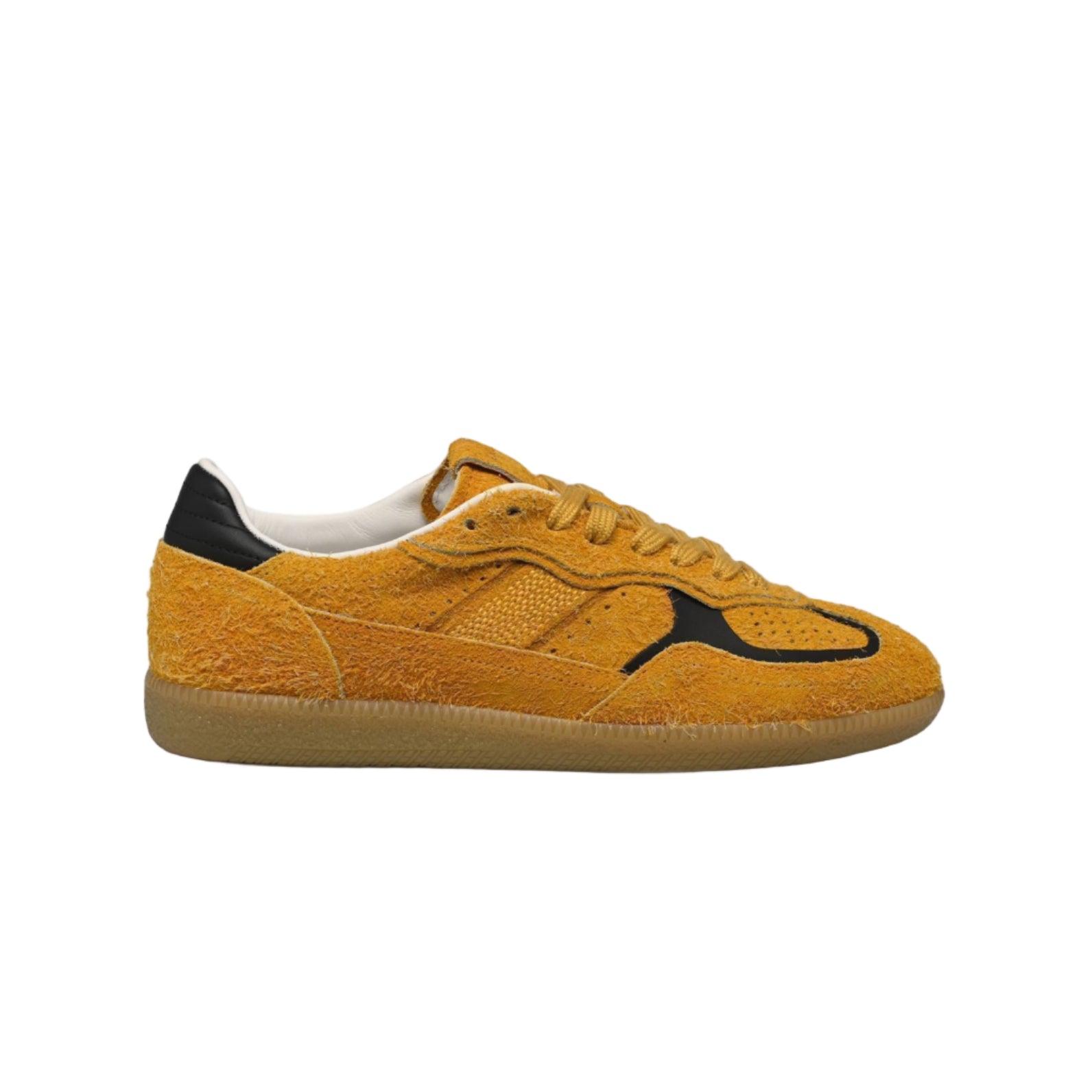 Yellow sneaker with black accents on a white background