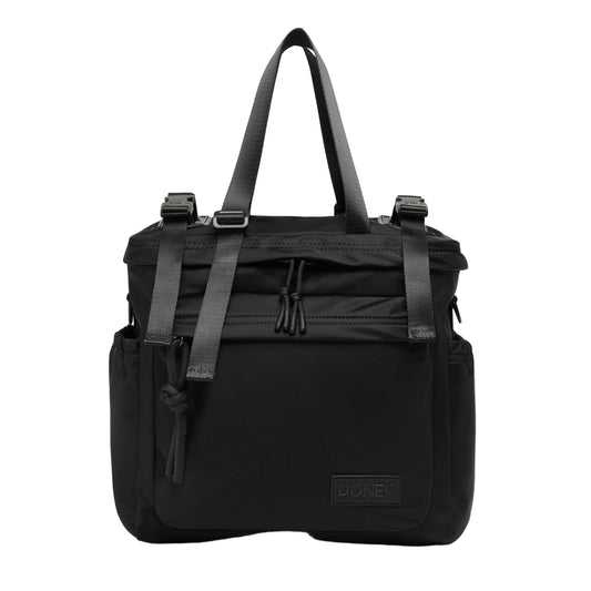 Black backpack with straps on a light gray background