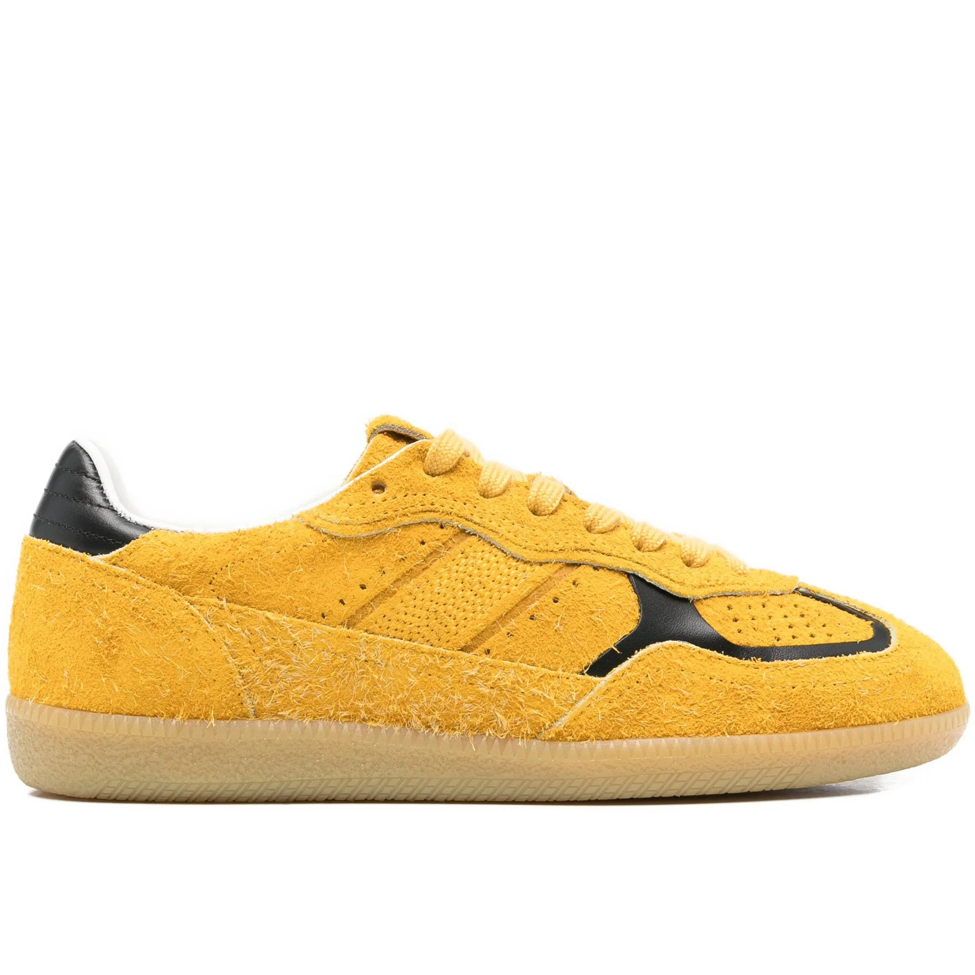 Yellow sneaker with black accents on a white background