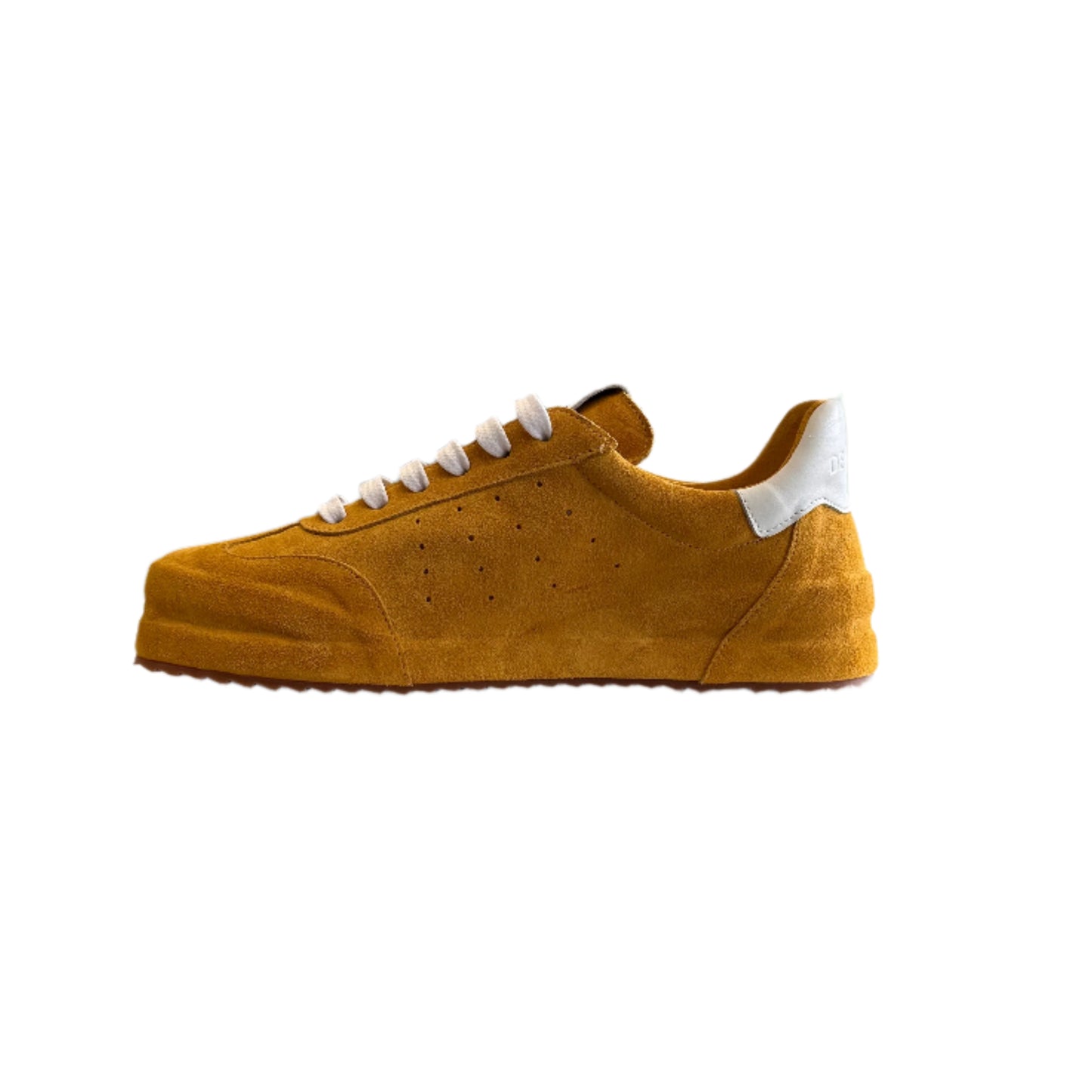 Yellow sneaker with white soles hanging on a white wall
