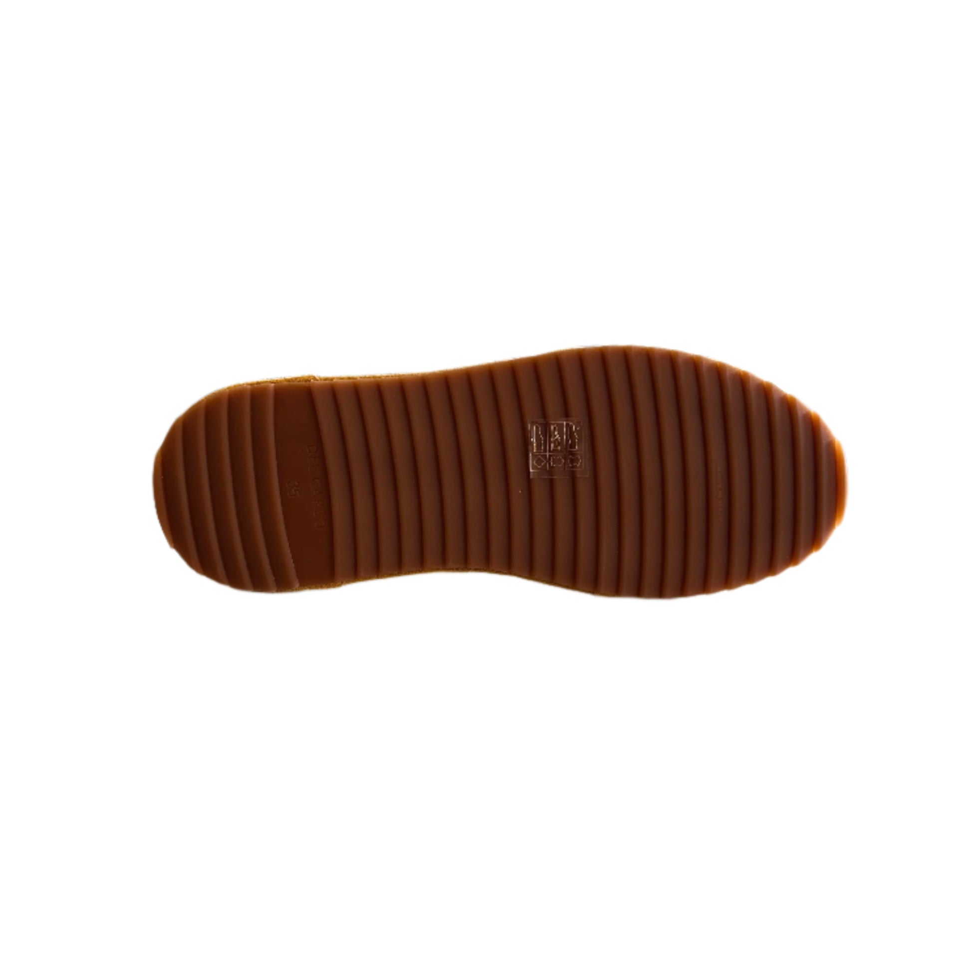 Close-up of a shoe sole with a store interior in the background