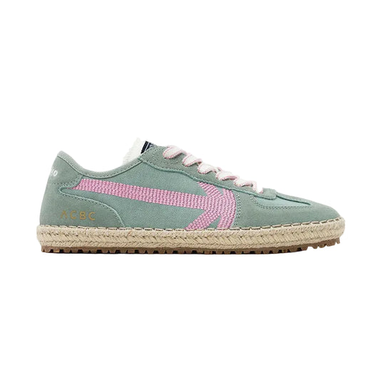 Green sneaker with pink accents on a white background
